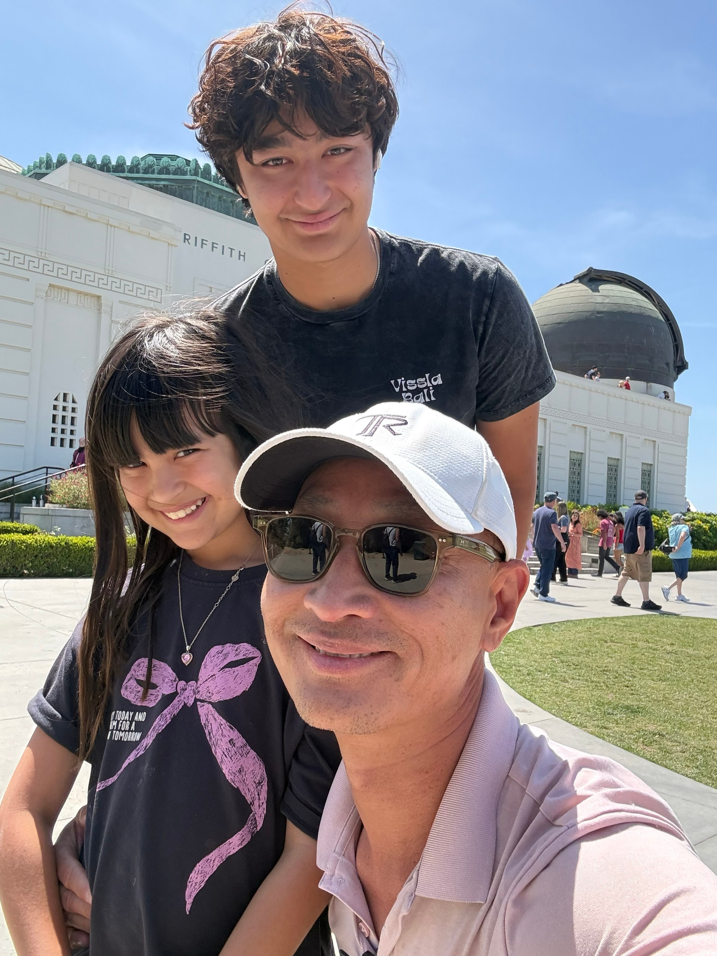 Dad with two kids at Griffith Observatory selfie